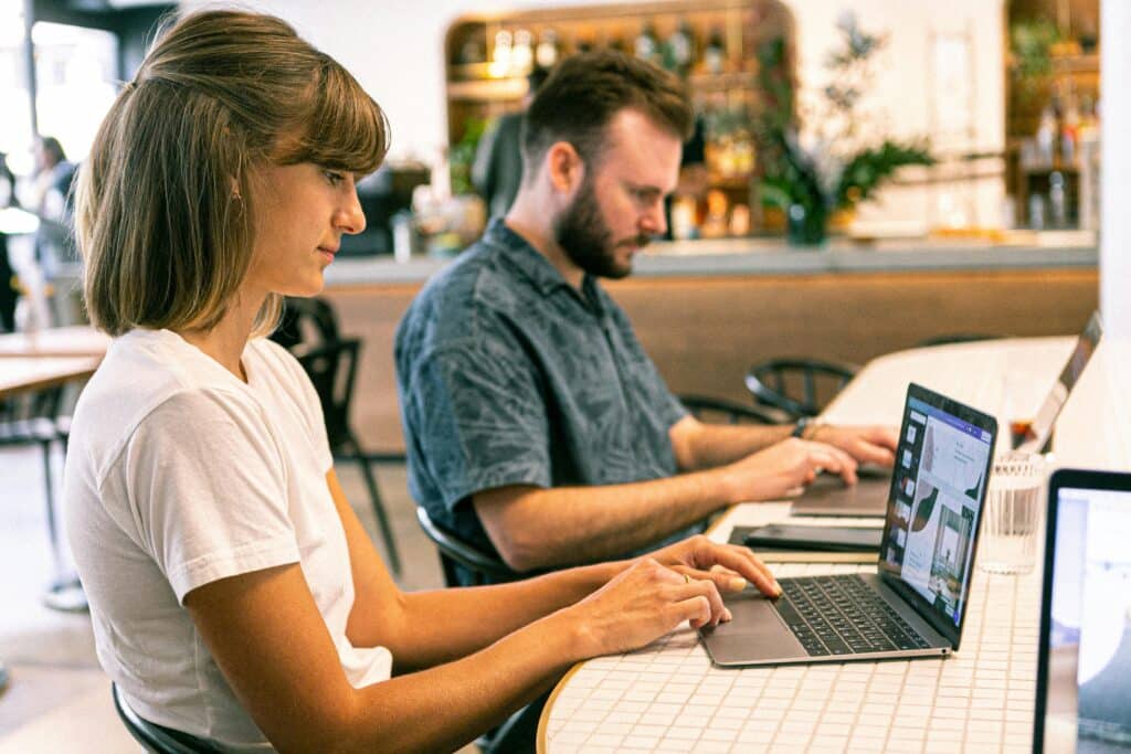 Freelancers hustling to build a client base. Photo by Canva Studio: https://www.pexels.com/photo/photo-of-woman-using-laptop-3194518/