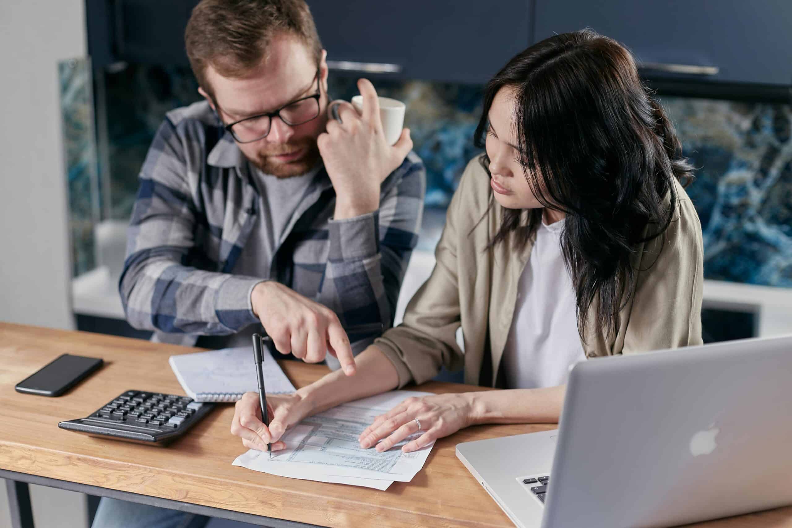 Photo by Mikhail Nilov: https://www.pexels.com/photo/couple-calculating-all-their-bills-6964107/