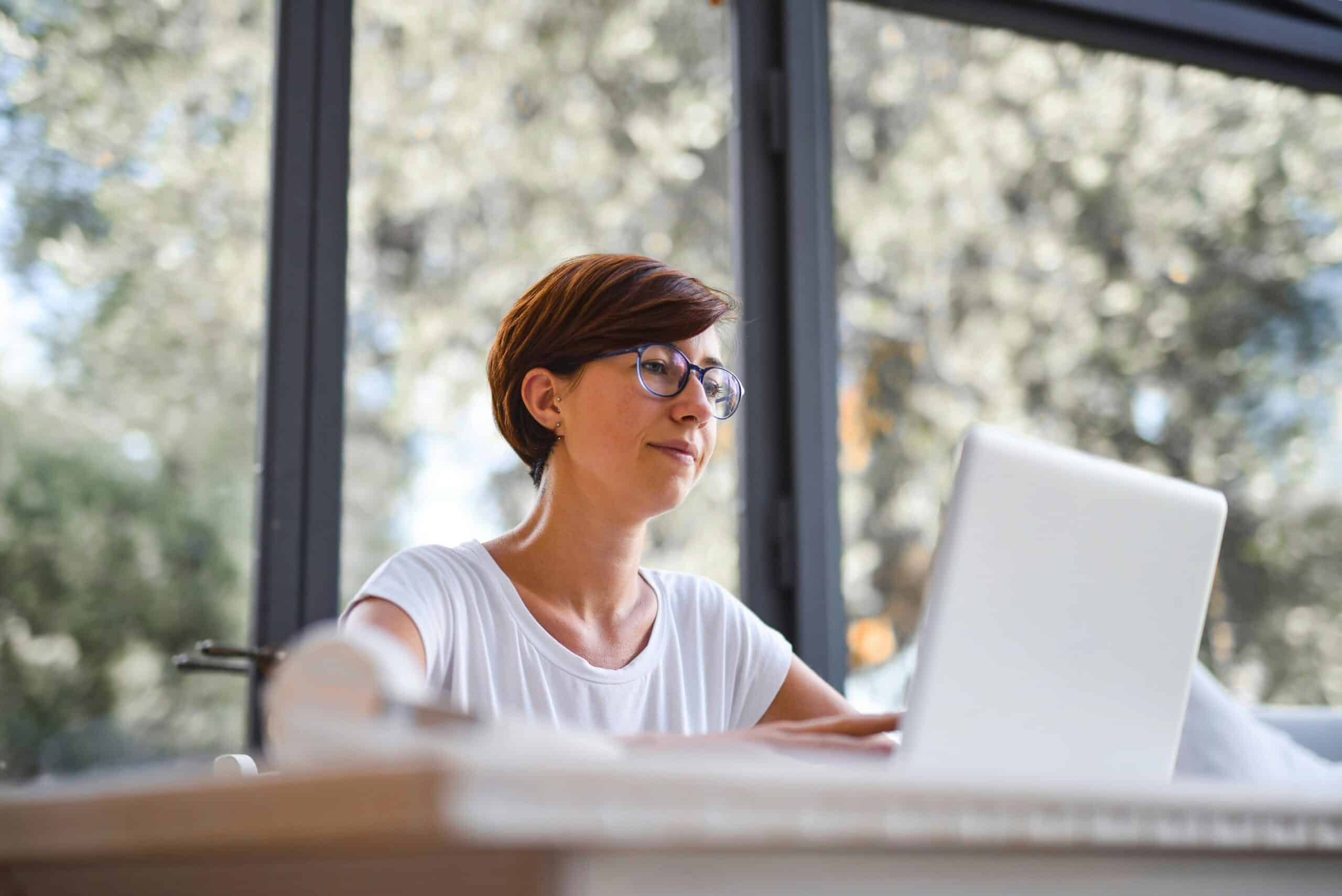 Photo by Andrea Piacquadio: https://www.pexels.com/photo/woman-in-white-crew-neck-shirt-wearing-brown-framed-eyeglasses-using-macbook-3768161/